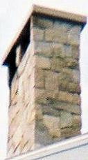 Granite chimney built with stone cap