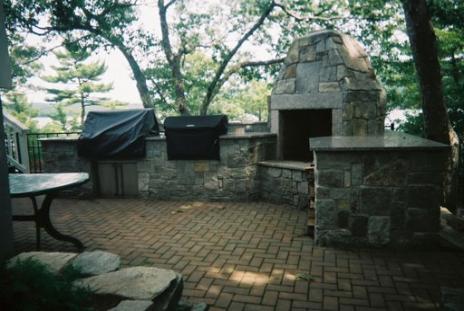 Outside Mosaic granite kitchen with fireplace